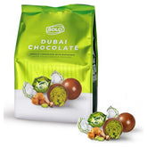 A green package of Bolci Dubai Chocolate Truffles with Kadayif & Pistachio Filling (120g), featuring chocolate sweets with creamy pistachios, kadayif, and whole pistachio nuts.